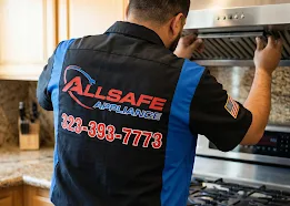 Allsafe Appliance technician installing and servicing a kitchen appliance
