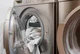 Front load washer with towels in the drum before fixing an off balance load