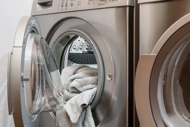Front load washer with towels in the drum before fixing an off balance load